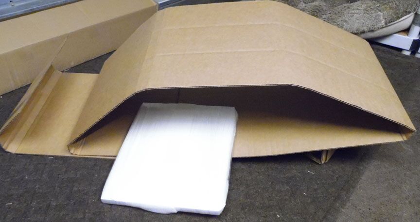 But we did need to unroll the inner roll.<br />Look at how much cardboard they used<br />to protect the door.