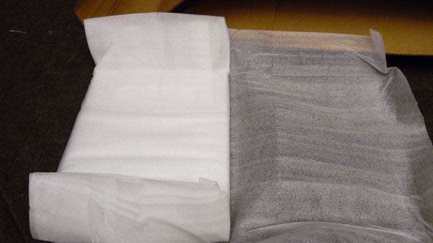 Then unroll the foam. There is a lot of it too.<br />Doors are protected well. Multiple doors may<br />be stacked in layers of foam.