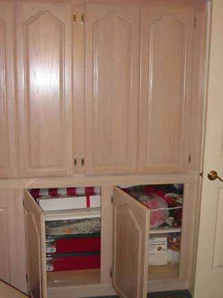 A really nice full wall of cabinets.<br />Lots of storage space with great<br />wood cabinet doors.