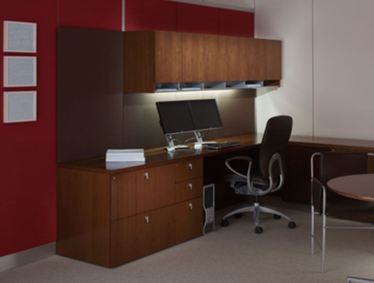 This is what I think of for a normal small office set up. Focused light on your work area. With only overhead lighting, the desk would not b